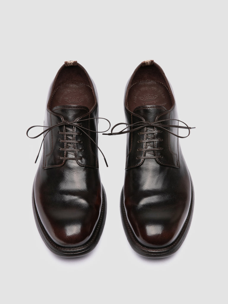 CHRONICLE 001 - Derby in Pelle Marrone