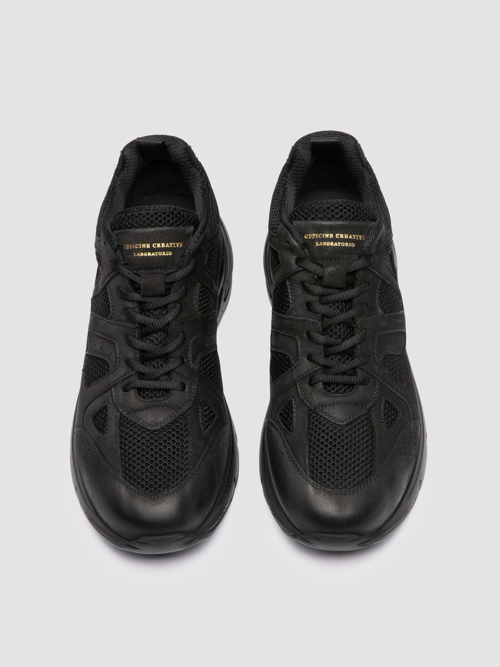 SUPURBIA 001 - Black Leather and Suede Low Top Sneakers